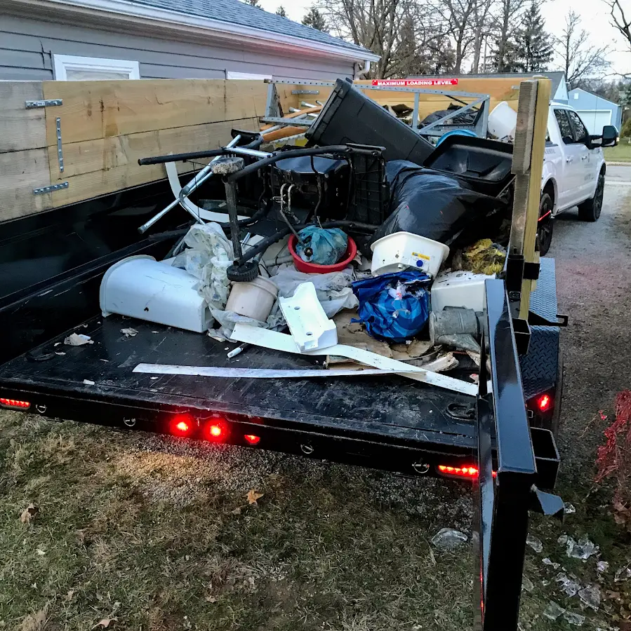 Roll-off dumpster delivered to a residential driveway in Rineyville